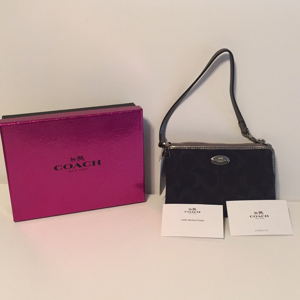 Coach Brand new Black Wristlet in box
